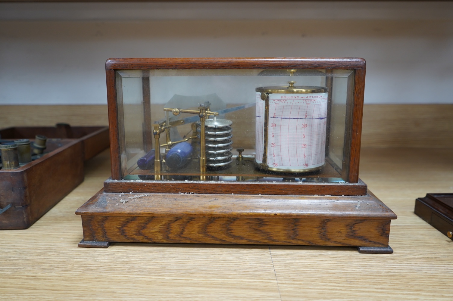 An oak cased barograph with integral barometer by Thomas Armstrong & Bro. Ltd. 78 Deansgate, Manchester, with bevelled glass panels and drawer to base, 37cm wide, 23cm deep, 22cm high. Condition - good, untested.